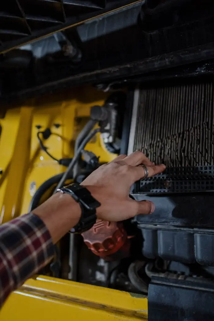 Close-up of a hand inspecting a truck